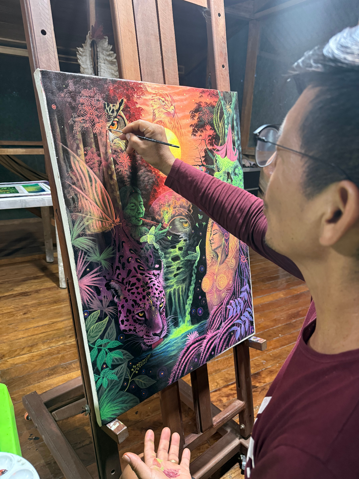 Painting a vision in the studio, Pucallpa